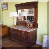 F48. Eastlake dresser with mirror and marble top. 76”h x 41”w x 19”d - $275 
